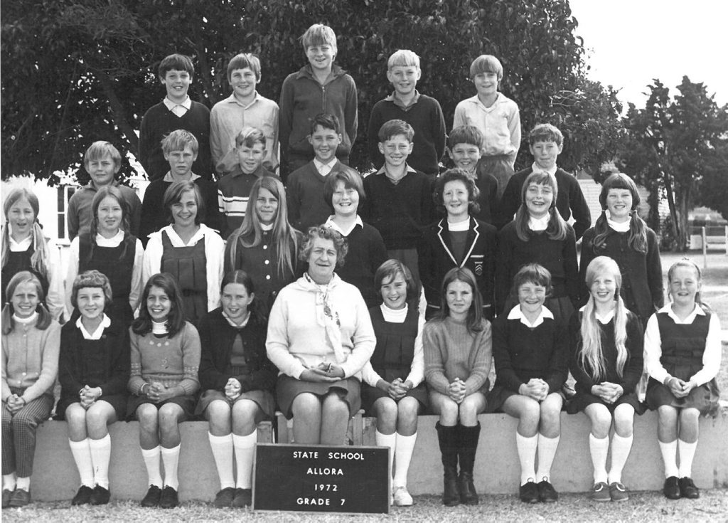 Allora State School Grade 7, 1972. Back Row: David Renton, Robin Fisher, Stephen Bradley Stallman, Bradley Weier, Mark Lehmann. Third Row: Phillip Drewery, Graham Free, David Atkinson, Peter Corbett, Gordon Fredericks, Derrick Dau, Glen Larkin. Second Row: Judith Abernethy, Norma Smith, Helen Ruhle, Jessica Mynarends, Catherine Frizzell, Cheryl Parker, Robyn Hoey, Janelle Holzwart. Front Row: Sheree Shapland, Debra Burge, Heather Clarke, Nancy Bray, Teacher Mrs. S. Mulkerin, Wendy Whitton, Wendy Crookey, Penelope Betts, Toni Rix, Leanne Graham, Sharon Wright.