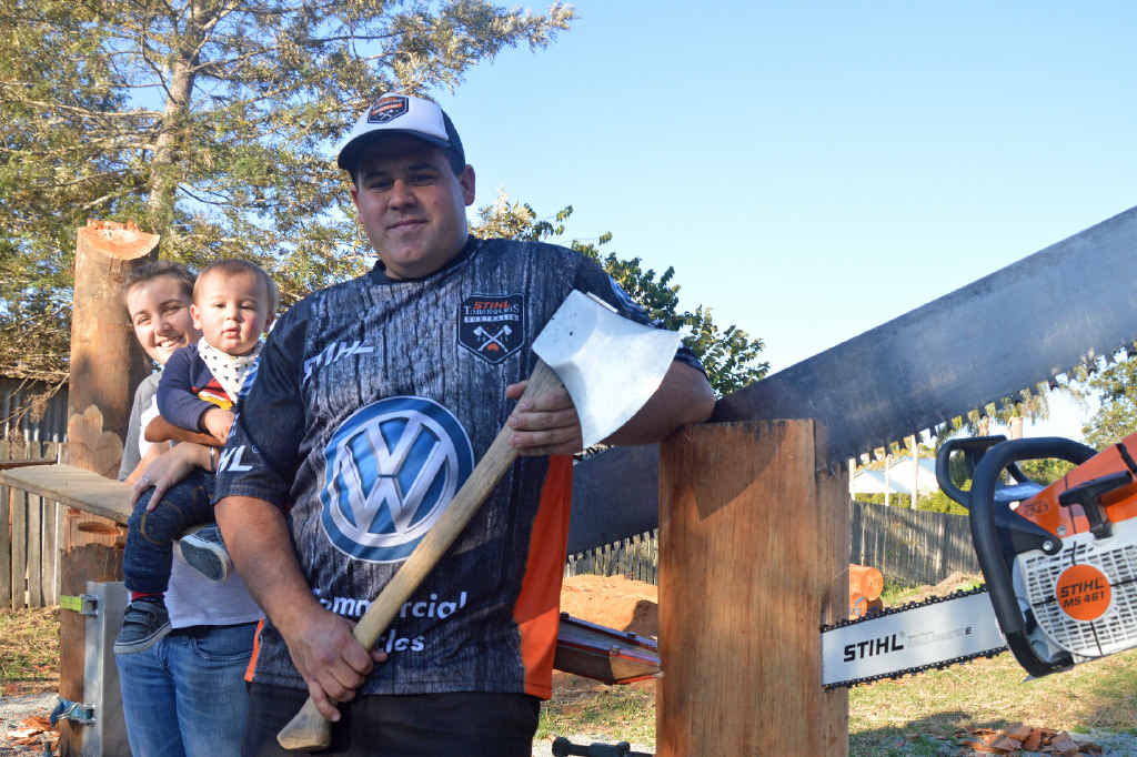 FAMILY MAN: Grafton woodchopper Chris Owen with partner Niki Phillips and son Will (15 months) ahead of this weekend’s Stihl Timbersports Series. PHOTO: BILL NORTH FAMILY MAN: Grafton woodchopper Chris Owen with partner Niki Phillips and son Will (15 months) ahead of this weekend’s Stihl Timbersports Series. PHOTO: BILL NORTH