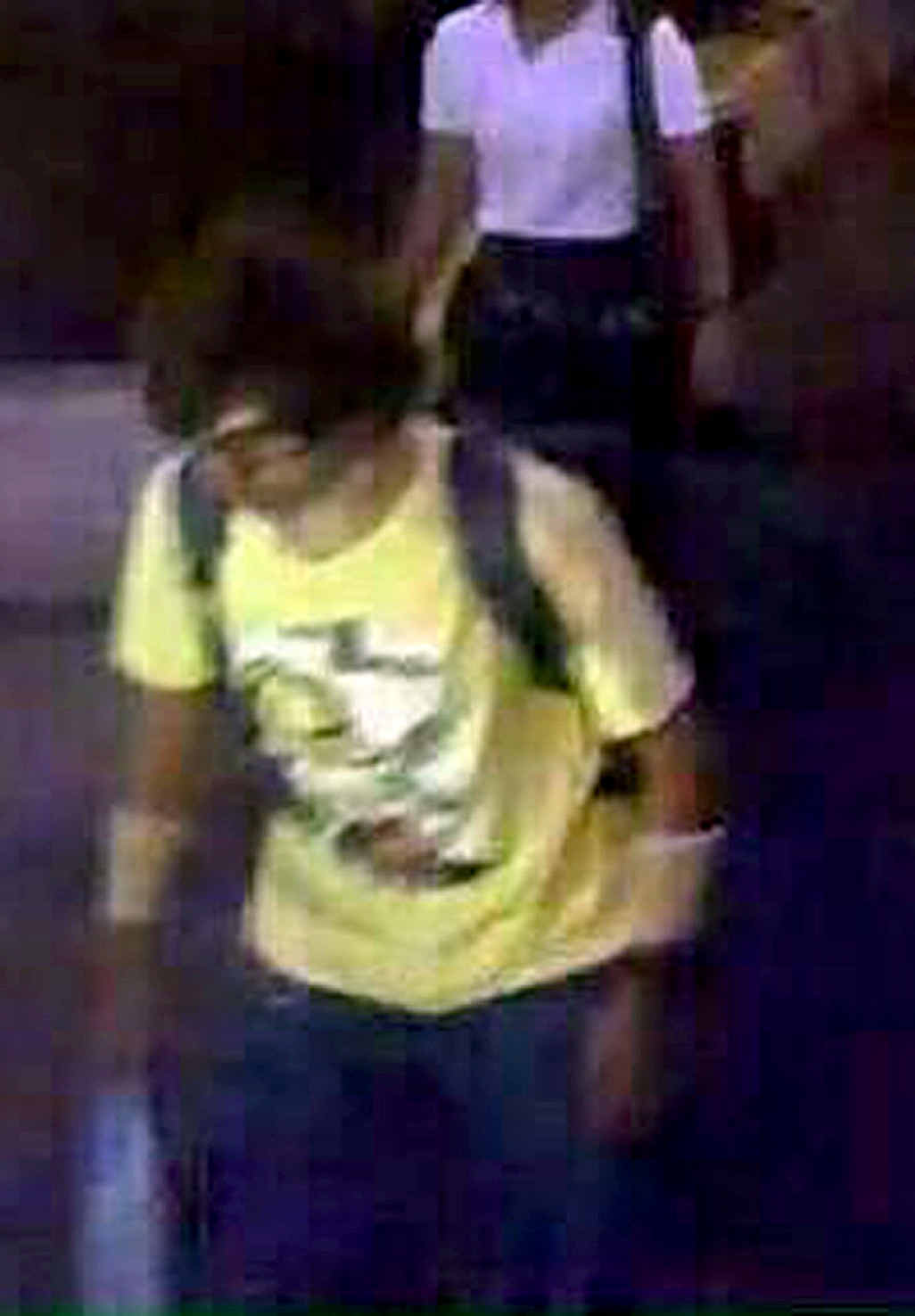NOT ME: Former Ballina man Sunnry Burns in Thailand and, inset, this image, released by Royal Thai Police shows a man wearing a yellow T-shirt near the Erawan Shrine before an explosion occurred in Bangkok. NOT ME: Former Ballina man Sunnry Burns in Thailand and, inset, this image, released by Royal Thai Police shows a man wearing a yellow T-shirt near the Erawan Shrine before an explosion occurred in Bangkok.