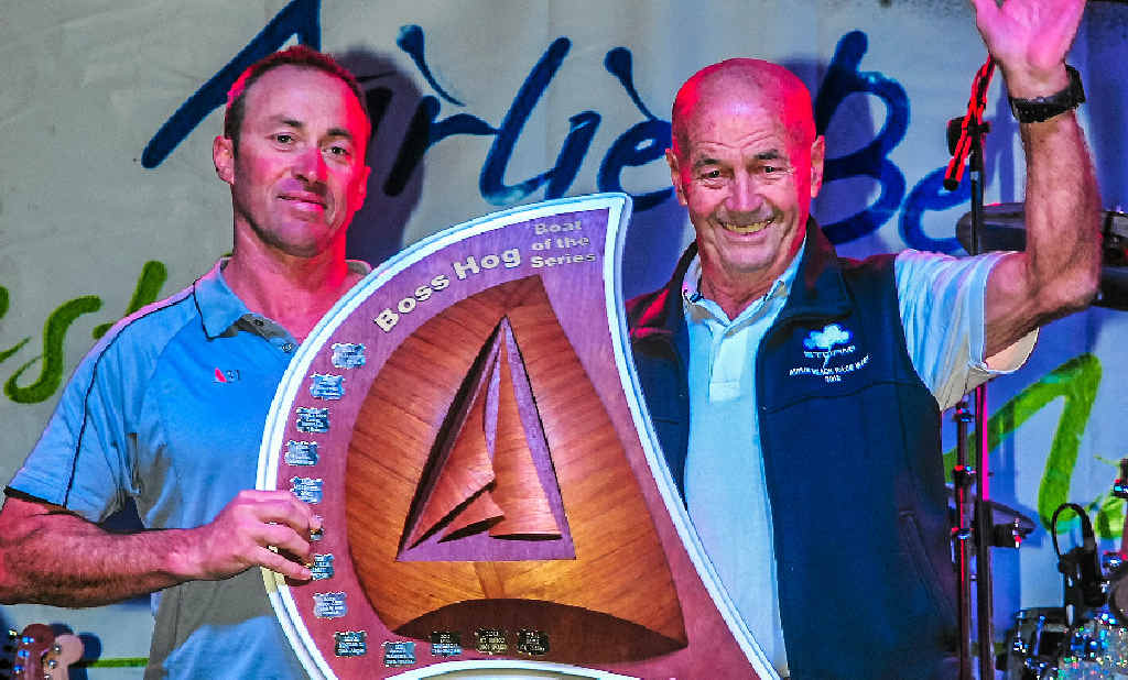 Airlie Beach Race Week founder Don Algie (right) presents Jason Close with the Boss Hog trophy. Photo: Andrew Pattinson Airlie Beach Race Week founder Don Algie (right) presents Jason Close with the Boss Hog trophy. Photo: Andrew Pattinson