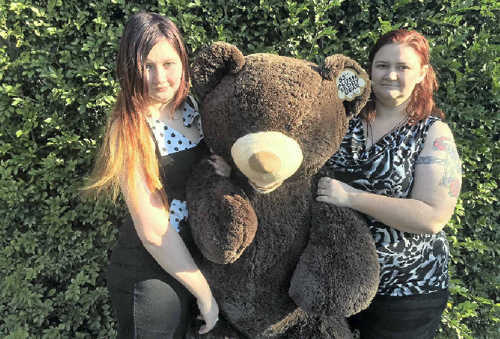 DISAPPOINTED: Year 11 Tullawong High School student Jourdan Marden with mum Samantha and a giant teddy bear raffle prize, bought as part of the drive to raise money for orphans in Cambodia. DISAPPOINTED: Year 11 Tullawong High School student Jourdan Marden with mum Samantha and a giant teddy bear raffle prize, bought as part of the drive to raise money for orphans in Cambodia.