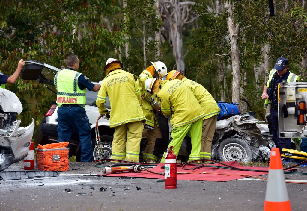 Firefighters work to free a driver trapped in a Sunshine Motorway crash at Peregian Springs. Firefighters work to free a driver trapped in a Sunshine Motorway crash at Peregian Springs.