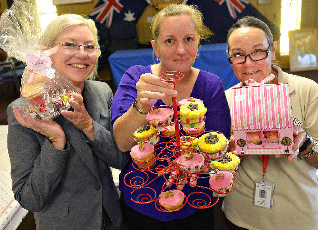 BIG CAKE BAKE: Member for Bundaberg Leanne Donaldson, Sonya Leijen and Carol Delnevo work together to raise funds at the Red Cross Big Cake Bake hosted by the Defence Veterans. BIG CAKE BAKE: Member for Bundaberg Leanne Donaldson, Sonya Leijen and Carol Delnevo work together to raise funds at the Red Cross Big Cake Bake hosted by the Defence Veterans.