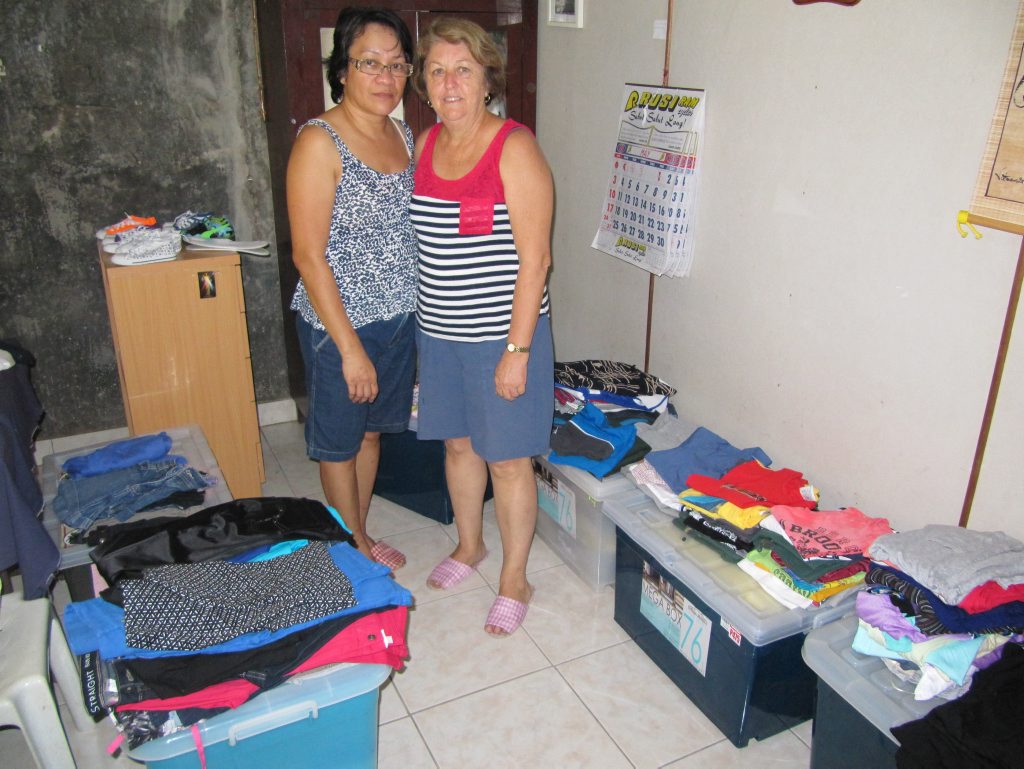 Virgie Cox and Val Corfield sorting through uniforms for the children from Kitcharao. Photo Contributed Virgie Cox and Val Corfield sorting through uniforms for the children from Kitcharao. Photo Contributed