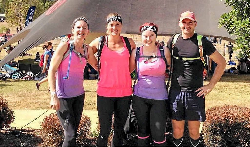 TOUGH: Marisa Kent, Bec Swanton, Kyla Sprecher and Clint Swanton at the start line of the Spartan Super 14km obstacle race. 