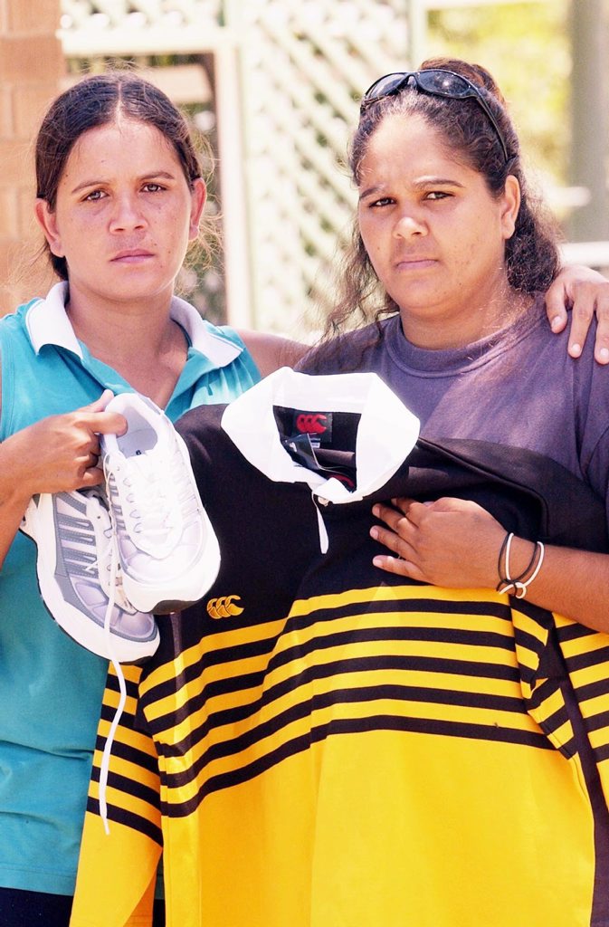 Theresa Binge's daughters Daylene and Hannah Barlow hold clothing similar to what their mother was wearing when she disappeared. Theresa Binge's daughters Daylene and Hannah Barlow hold clothing similar to what their mother was wearing when she disappeared.