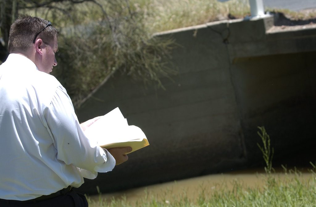 Detective Sergeant Greg Lamey at the site on Boomi Rd where Ms Binge's body was found. Detective Sergeant Greg Lamey at the site on Boomi Rd where Ms Binge's body was found.