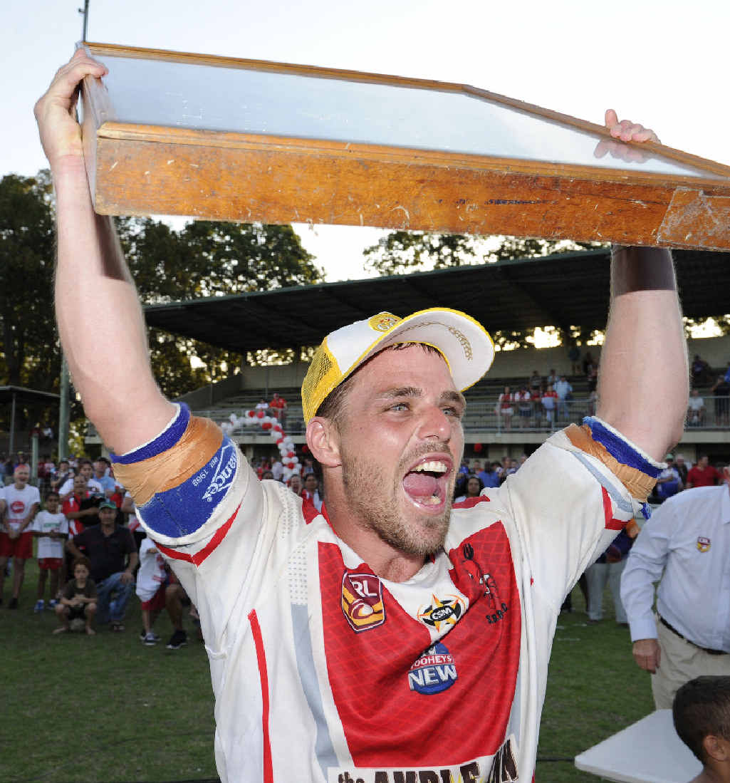 VICTORIOUS: South Grafton Rebels captain Rhys Walters holds the Group 2 first grade premiership aloft. VICTORIOUS: South Grafton Rebels captain Rhys Walters holds the Group 2 first grade premiership aloft.