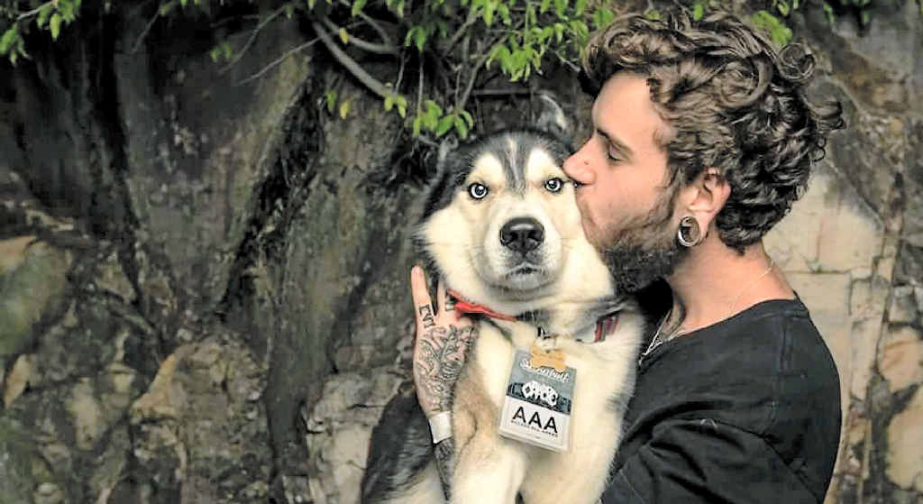 PUPPY LOVE: Daniel Lohrey with his four-year-old husky Xero. PUPPY LOVE: Daniel Lohrey with his four-year-old husky Xero.