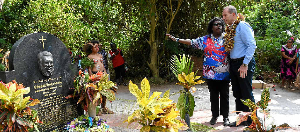 REMEMBERING THE FIGHT: Prime Minister Tony Abbott and Gail Mabo laid a wreath on Eddie Mabo’s grave on Mer Island in the Torres Strait. REMEMBERING THE FIGHT: Prime Minister Tony Abbott and Gail Mabo laid a wreath on Eddie Mabo’s grave on Mer Island in the Torres Strait.