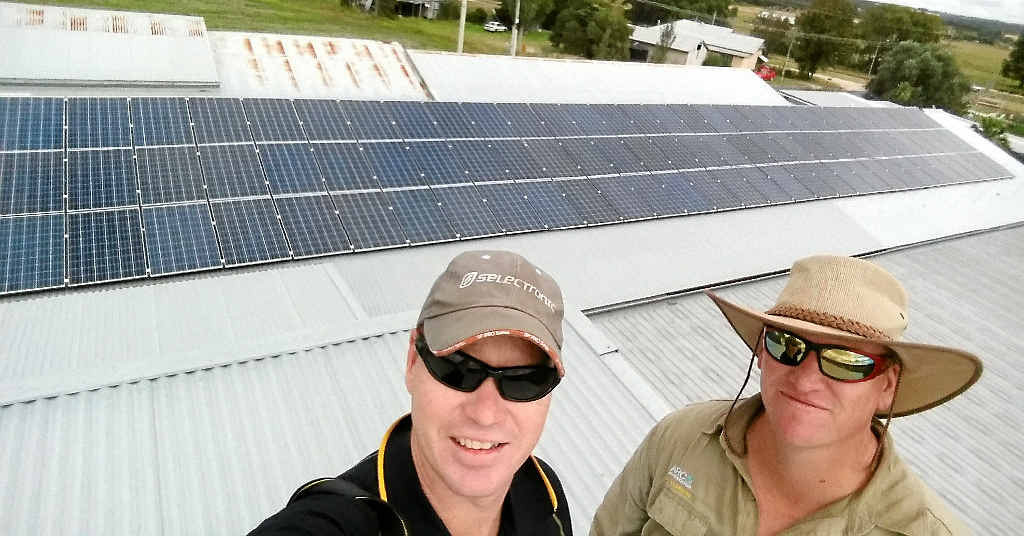 POWER SOLUTION: Tim Hourigan and electrician Alex Briers with the final product. POWER SOLUTION: Tim Hourigan and electrician Alex Briers with the final product.