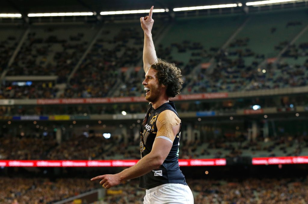 MELBOURNE, AUSTRALIA - JULY 31: Ty Vickery of the Tigers celebrates a goal during the 2015 AFL round 18 match between the Hawthorn Hawks and the Richmond Tigers at the Melbourne Cricket Ground, Melbourne, Australia on July 31, 2015. (Photo by Michael Willson/AFL Media/Getty Images) MELBOURNE, AUSTRALIA - JULY 31: Ty Vickery of the Tigers celebrates a goal during the 2015 AFL round 18 match between the Hawthorn Hawks and the Richmond Tigers at the Melbourne Cricket Ground, Melbourne, Australia on July 31, 2015. (Photo by Michael Willson/AFL Media/Getty Images)