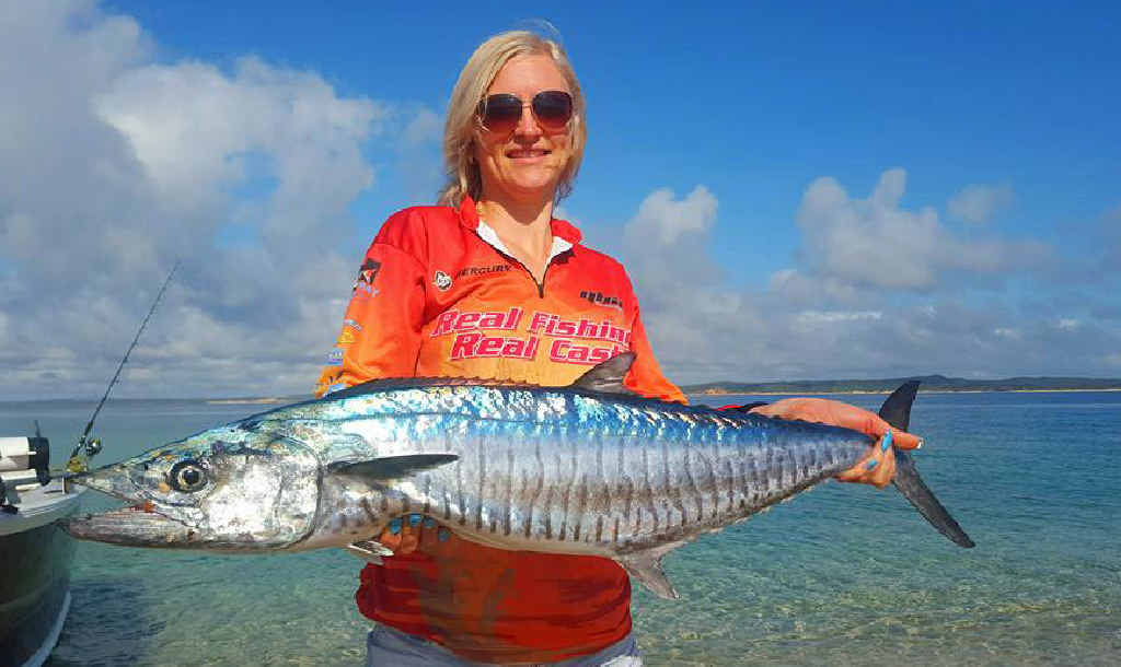 NAILED IT: Katrina Neill with her brightly painted nails showing off her spanish mackerel. NAILED IT: Katrina Neill with her brightly painted nails showing off her spanish mackerel.