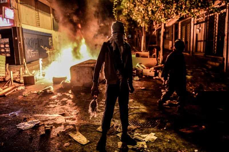 A masked kurdish militant holds a molotov cocktails in front of a burning barricade during clashes with Turkish police on August 27,2015 in the Gazi district of Istanbul. Five people, including two children and a soldier, were killed in clashes between Kurdish militants and security forces in Turkey's restive Kurdish-majority southeast on August 27, 2015, local officials and the army said. A masked kurdish militant holds a molotov cocktails in front of a burning barricade during clashes with Turkish police on August 27,2015 in the Gazi district of Istanbul. Five people, including two children and a soldier, were killed in clashes between Kurdish militants and security forces in Turkey's restive Kurdish-majority southeast on August 27, 2015, local officials and the army said.