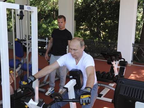 Medvedev watches Putin work out Medvedev watches Putin work out