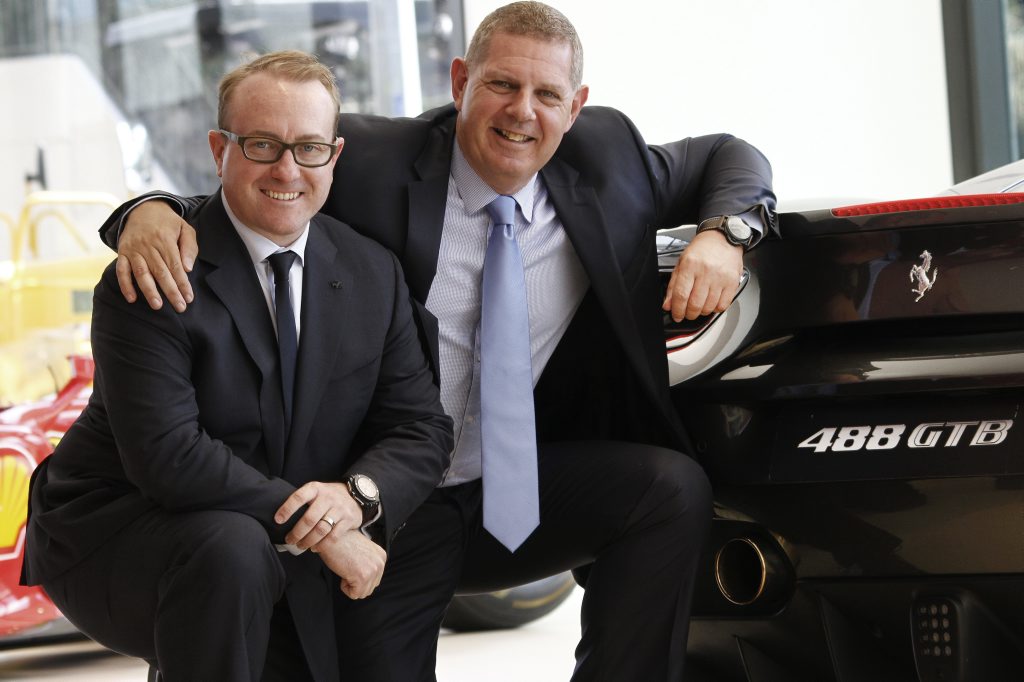 (left) Herbert Appleroth, President and CEO of Ferrari Australasia, with Martin Roller, managing director of Ferrari Brisbane, with a 488 GTB at the new Ferrari Brisbane dealership the day of its grand opening. Photo: Iain Curry / Sunshine Coast Daily (left) Herbert Appleroth, President and CEO of Ferrari Australasia, with Martin Roller, managing director of Ferrari Brisbane, with a 488 GTB at the new Ferrari Brisbane dealership the day of its grand opening. Photo: Iain Curry / Sunshine Coast Daily