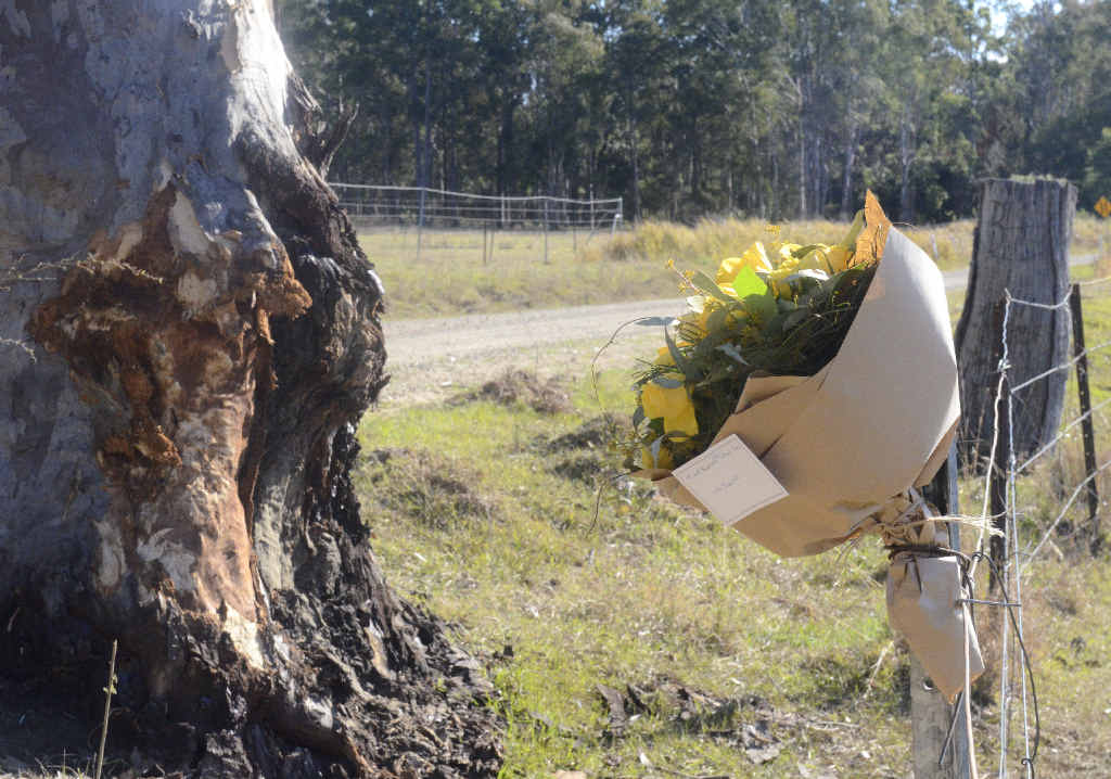 MISSED: Flowers have been laid at the site of the crash which claimed the life of 17-year-old Ramornie girl Kiara Joe, inset. MISSED: Flowers have been laid at the site of the crash which claimed the life of 17-year-old Ramornie girl Kiara Joe, inset.