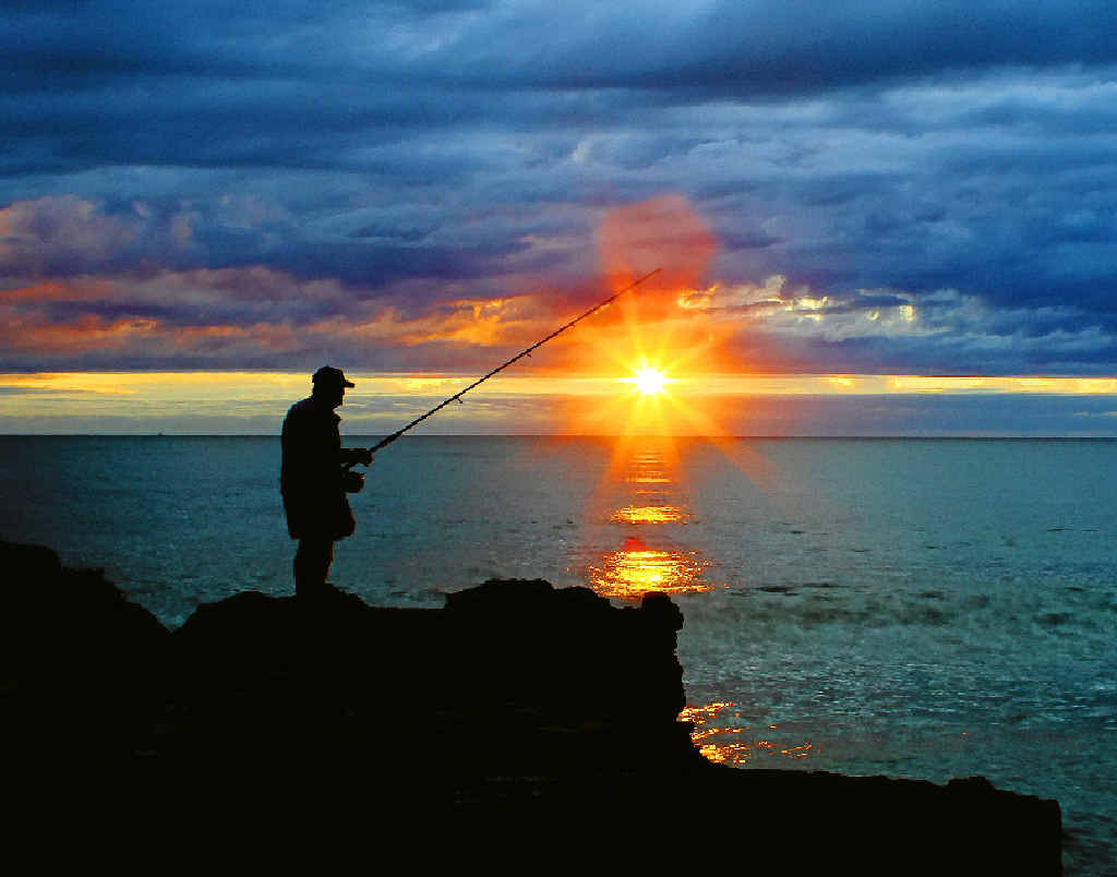 SUNRISE OVER SEA: An angler fishing at dawn at Yamba’s Turners Beach. PHOTO: DEBRAH NOVAK SUNRISE OVER SEA: An angler fishing at dawn at Yamba’s Turners Beach. PHOTO: DEBRAH NOVAK