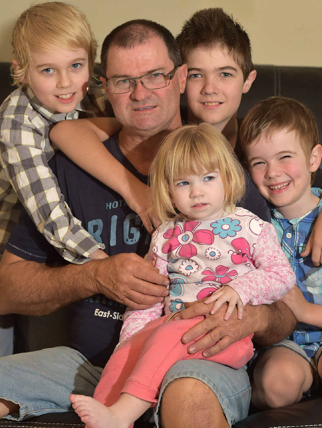 ALL FOR THE KIDS: Paul Howarth with his children Josh, 9, Ben, 11, Stephanie, 2, and Cameron, 6. ALL FOR THE KIDS: Paul Howarth with his children Josh, 9, Ben, 11, Stephanie, 2, and Cameron, 6.