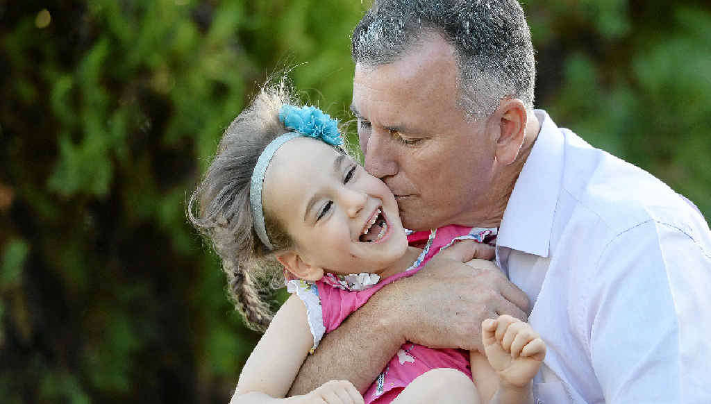 Daniel Lukan and his daughter Grace, who has cerebral palsy. Daniel Lukan and his daughter Grace, who has cerebral palsy.