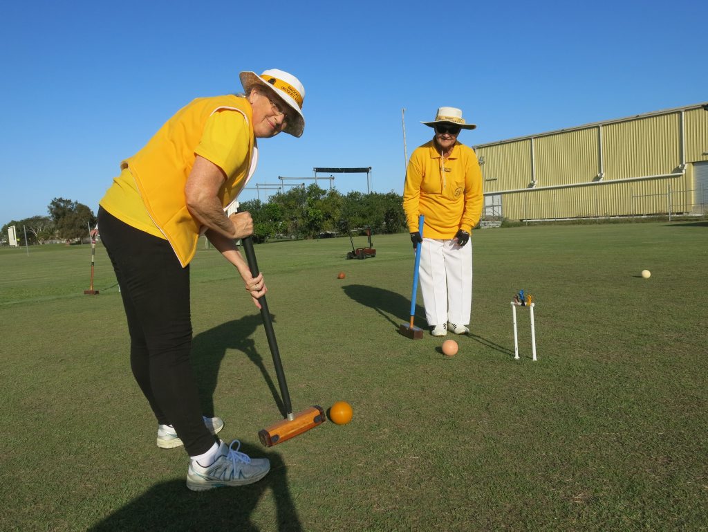INTERESTING SPORT: Dianne Horsman and Dot Briggs at the Mackay Croquet Club. Photo Chris Lees / Daily Mercury