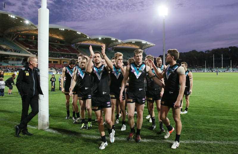 Port Players thanks the supporters as they leave Adelaide Oval for the final time in the 2015 season during the Round 23 AFL match between Port Adelaide Power and the Fremantle Dockers at Adelaide Oval in Adelaide, Saturday, Sept 5, 2015. Port Players thanks the supporters as they leave Adelaide Oval for the final time in the 2015 season during the Round 23 AFL match between Port Adelaide Power and the Fremantle Dockers at Adelaide Oval in Adelaide, Saturday, Sept 5, 2015.