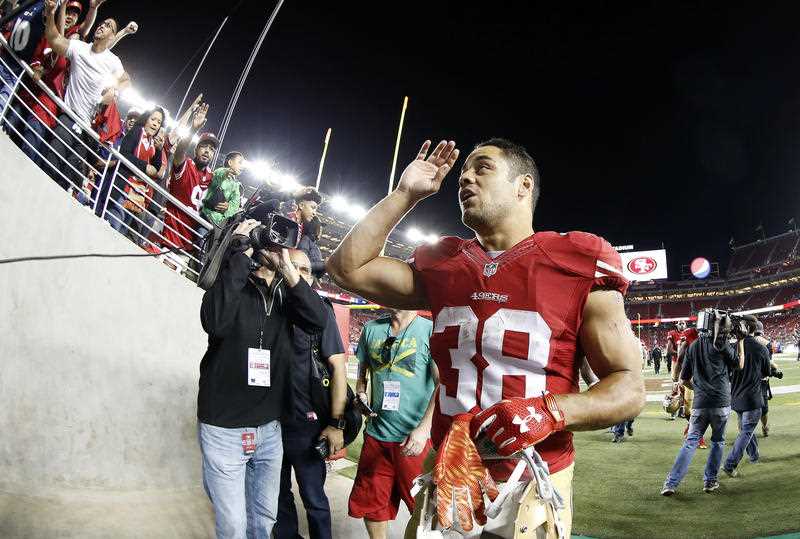 In this photo taken with a fisheye lens, San Francisco 49ers running back Jarryd Hayne (38) waves to fans after an NFL preseason football game against the San Diego Chargers in Santa Clara, Calif., Thursday, Sept. 3, 2015. The 49ers won 14-12. In this photo taken with a fisheye lens, San Francisco 49ers running back Jarryd Hayne (38) waves to fans after an NFL preseason football game against the San Diego Chargers in Santa Clara, Calif., Thursday, Sept. 3, 2015. The 49ers won 14-12.