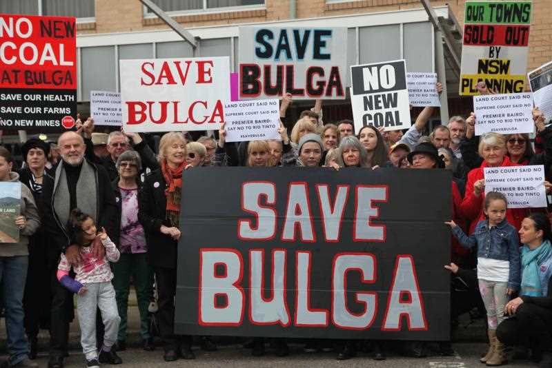 A supplied image of Bulga residents and their supporters rallying outside of the PAC meeting to oppose the expansion of the mine, Hunter Valley, Tuesday, June 30. 2015. Residents of Bulga, are fighting against an expansion of Rio Tinto's Warkworth and Mount Thorley mines for the third time. A supplied image of Bulga residents and their supporters rallying outside of the PAC meeting to oppose the expansion of the mine, Hunter Valley, Tuesday, June 30. 2015. Residents of Bulga, are fighting against an expansion of Rio Tinto's Warkworth and Mount Thorley mines for the third time.