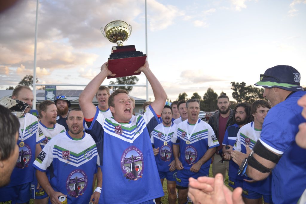 The Stanthorpe Gremlins during their team song after a grand final victory against Wallangarra.