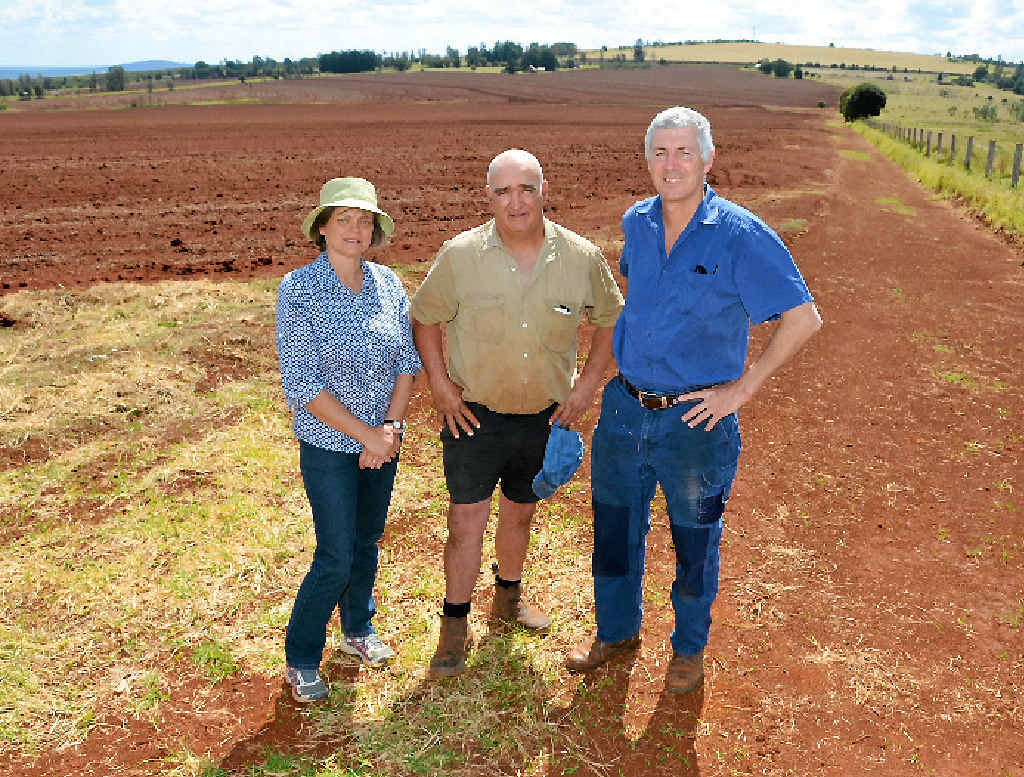 PRECIOUS LAND: John Dalton, Gary Tessmann and Neralie O’Sullivan are concerned about any move to explore mining on prime agricultural land. PRECIOUS LAND: John Dalton, Gary Tessmann and Neralie O’Sullivan are concerned about any move to explore mining on prime agricultural land.