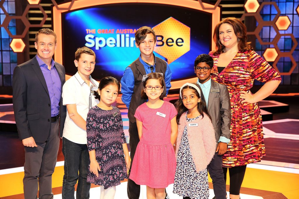 The Great Australian Spelling Bee hosts Grant Denyer, left, and Chrissie Swan, right, pictured with grand finalists Marko, Grace, Harrison, Mica, Harpita and Anirudh. The Great Australian Spelling Bee hosts Grant Denyer, left, and Chrissie Swan, right, pictured with grand finalists Marko, Grace, Harrison, Mica, Harpita and Anirudh.