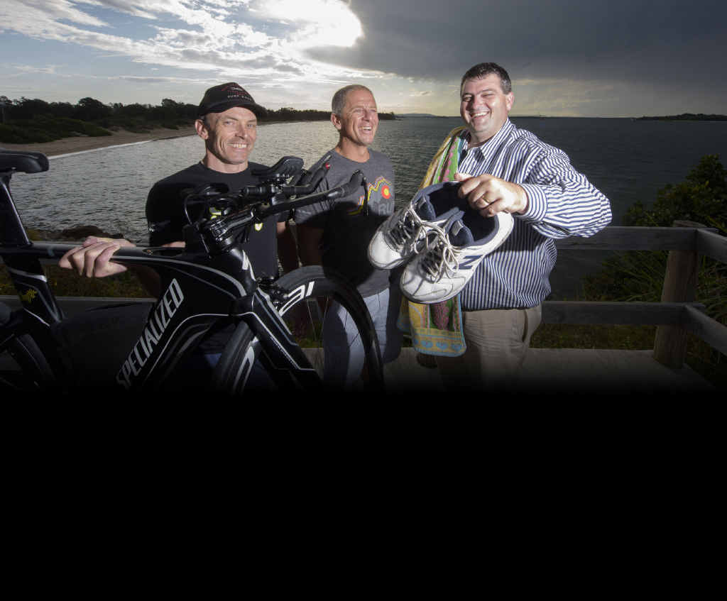 BACK FOR MORE: Clarence Valley Triathlon Club vice president Darren Adams, Elite Energy CEO Mark Emerton and Clarence Valley Council Mayor Richie Williamson at Whiting Beach to announce the Yamba Triathlon Festival will be held on February 27.PHOTO: ADAM HOURIGAN