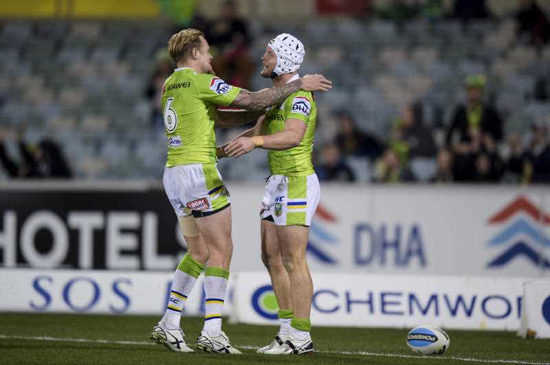 Jarrod Croker of the Raiders (right) celebrates with Blake Austin of the Raiders after scoring a try during the Round 25 NRL match between the Canberra Raiders and the Penrith Panthers at GIO Stadium in Canberra, Monday, Aug. 31, 2015. Jarrod Croker of the Raiders (right) celebrates with Blake Austin of the Raiders after scoring a try during the Round 25 NRL match between the Canberra Raiders and the Penrith Panthers at GIO Stadium in Canberra, Monday, Aug. 31, 2015.