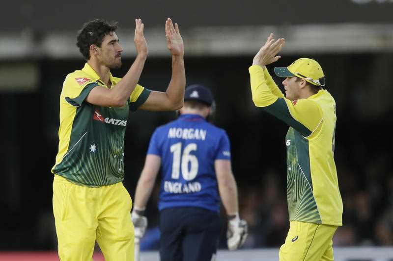 Australia’s Mitchell Starc, left, celebrates taking the wicket of England’s Liam Plunkett, with Australia’s Steven Smith during the One Day International cricket match between England and Australia at Lord's Cricket Ground, London, Saturday, Sept. 5, 2015. Australia’s Mitchell Starc, left, celebrates taking the wicket of England’s Liam Plunkett, with Australia’s Steven Smith during the One Day International cricket match between England and Australia at Lord's Cricket Ground, London, Saturday, Sept. 5, 2015.