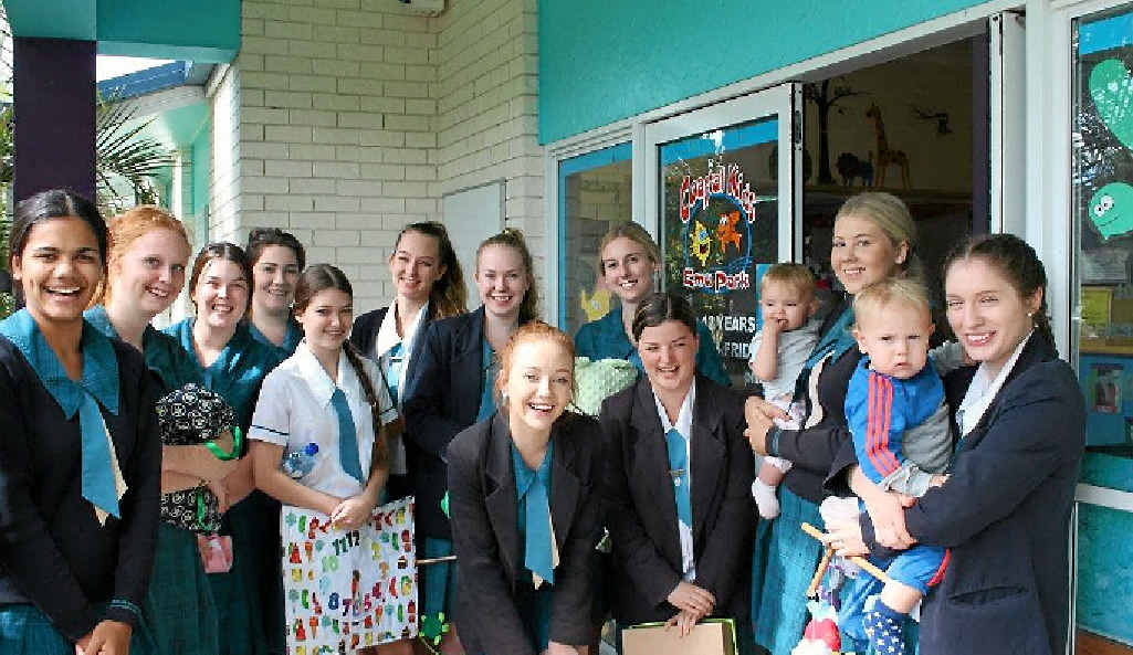 TOY TIME: St Ursula’s Year 12 Home Economics students enjoy their visit to Coastal Kids Child Care, Emu Park.