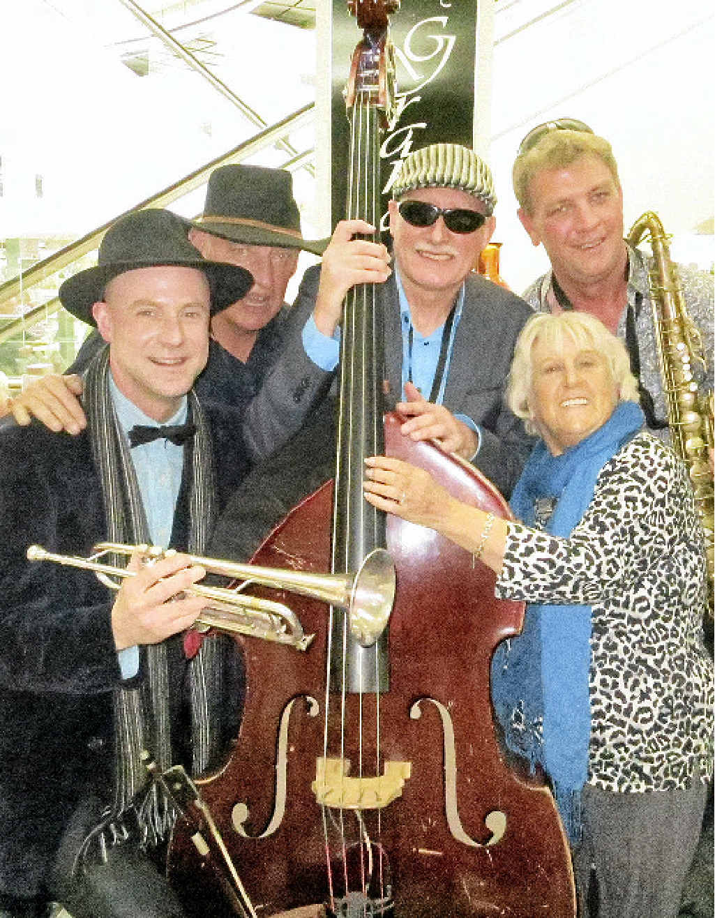 Carmel, a Gold Coast pensioner and jazz enthusiast, is pictured with new and old members of the group at the jazz festival – Mal Wood (trumpet), John Conley (double bass and bass guitar), Willy Qua (saxophone, flute and drums), and Richard Booth (sax, clarinet, trombone and steel drums). Carmel, a Gold Coast pensioner and jazz enthusiast, is pictured with new and old members of the group at the jazz festival – Mal Wood (trumpet), John Conley (double bass and bass guitar), Willy Qua (saxophone, flute and drums), and Richard Booth (sax, clarinet, trombone and steel drums).