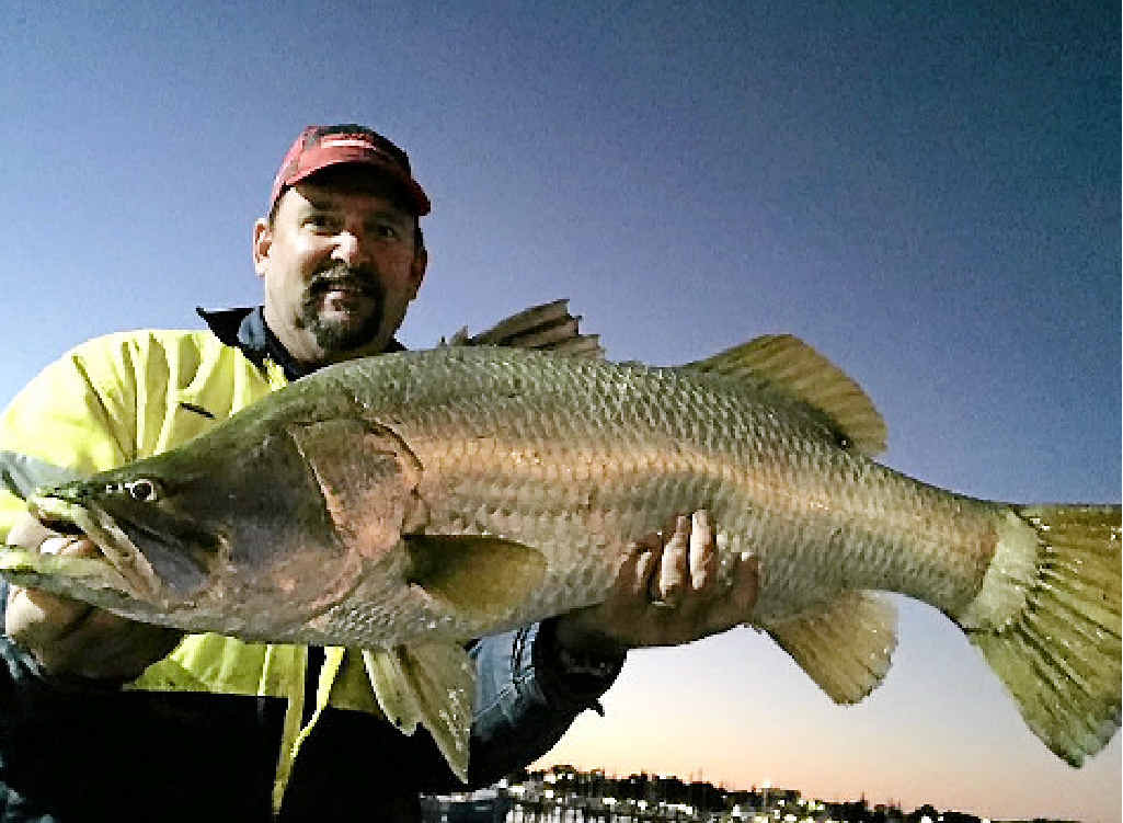 IMPRESSIVE: Pat laws with this solid 97cm barra caught on Wednesday evening. IMPRESSIVE: Pat laws with this solid 97cm barra caught on Wednesday evening.