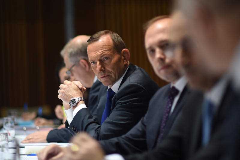 Australian Prime Minister Tony Abbott speaks to social and religious leaders during a roundtable event at Parliament House in Canberra, Friday, Sept. 11, 2015. Abbott is discussing the resettling 12,000 refugees from the conflict in Syria and Iraq. Australian Prime Minister Tony Abbott speaks to social and religious leaders during a roundtable event at Parliament House in Canberra, Friday, Sept. 11, 2015. Abbott is discussing the resettling 12,000 refugees from the conflict in Syria and Iraq.