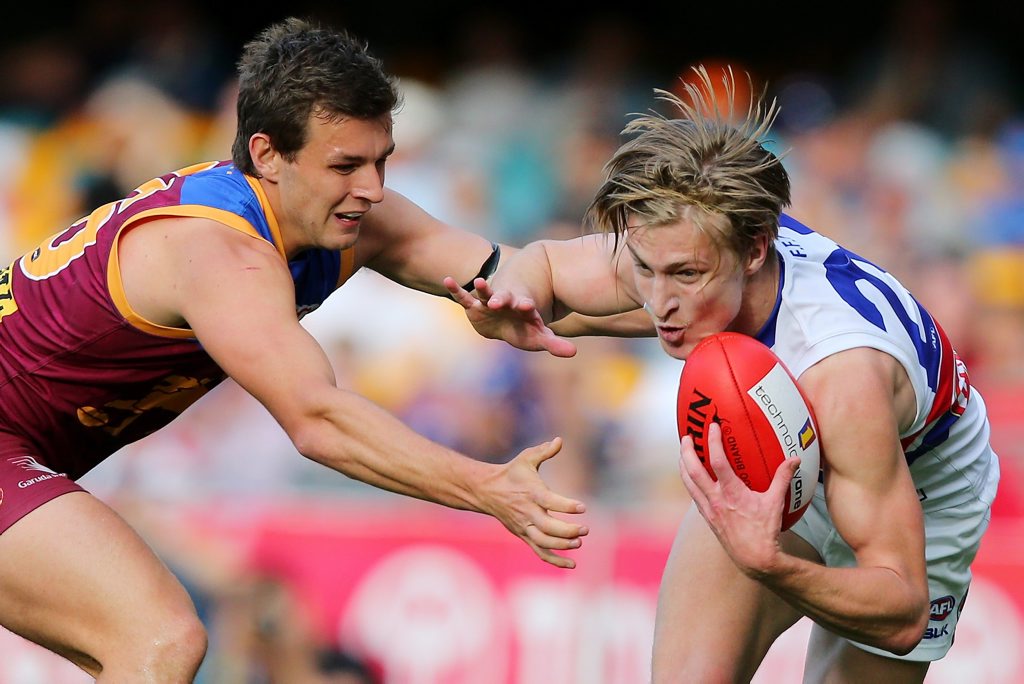 BRISBANE, AUSTRALIA - SEPTEMBER 05: Billy Evans of the Lions tackled Shane Biggs of the Bulldogs during the round 23 AFL match between the Brisbane Lions and the Western Bulldogs at The Gabba on September 5, 2015 in Brisbane, Australia. (Photo by Chris Hyde/Getty Images) BRISBANE, AUSTRALIA - SEPTEMBER 05: Billy Evans of the Lions tackled Shane Biggs of the Bulldogs during the round 23 AFL match between the Brisbane Lions and the Western Bulldogs at The Gabba on September 5, 2015 in Brisbane, Australia. (Photo by Chris Hyde/Getty Images)