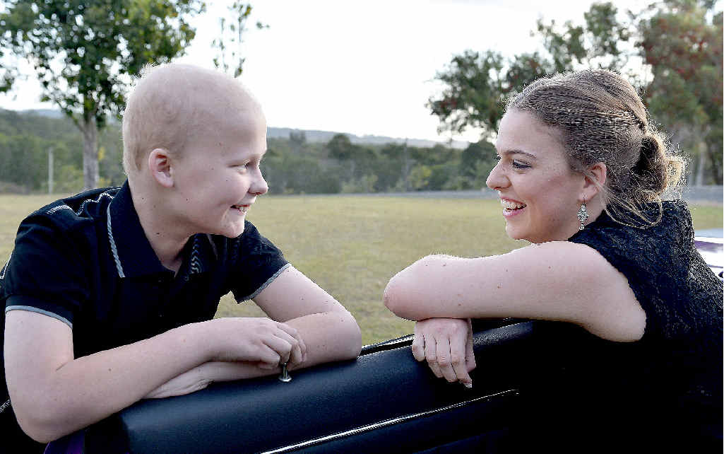 BROTHERLY LOVE: Mitchell Cawthray is undergoing chemotherapy treatment for brain cancer, but not even that could stop him from being there to hold open the car door for his sister Cassie’s formal. BROTHERLY LOVE: Mitchell Cawthray is undergoing chemotherapy treatment for brain cancer, but not even that could stop him from being there to hold open the car door for his sister Cassie’s formal.