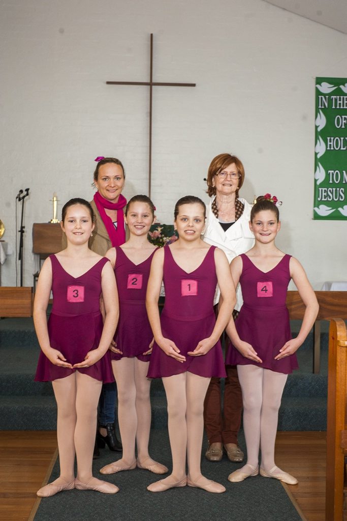 Toowoomba examination students (from left) Hope Morgan, Elsa Rose Helander, Jorja Wicks and Taylah Parker with Radiance Academy Principal Mrs Sally Andrew (back left) and Living Dance School Toowoomba former principal and current examiner and founder of Living Dance International Ms Beth Bluett de Baudistel. 