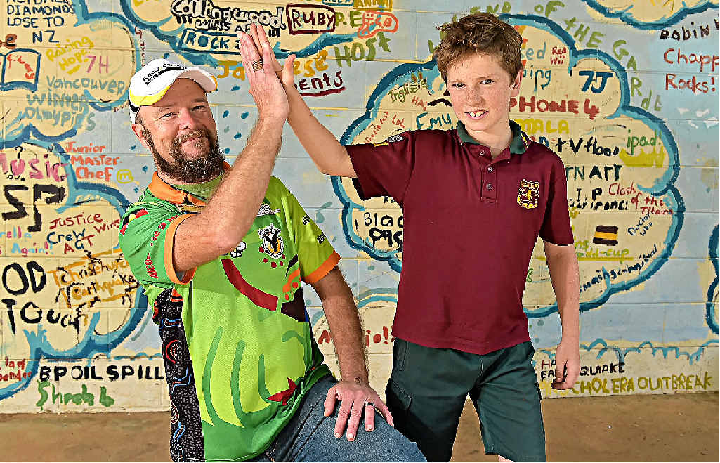 RECOVERED: Buderim Mountain State School chaplain David Larkin gets a high-five from Year 6 student Max Hargreaves. RECOVERED: Buderim Mountain State School chaplain David Larkin gets a high-five from Year 6 student Max Hargreaves.