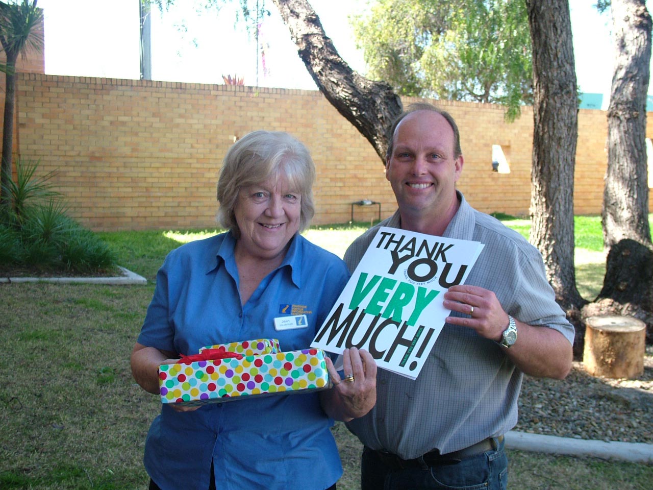 Volunteer Jean Frankland with Destination Southern Downs' Rob Hamilton.