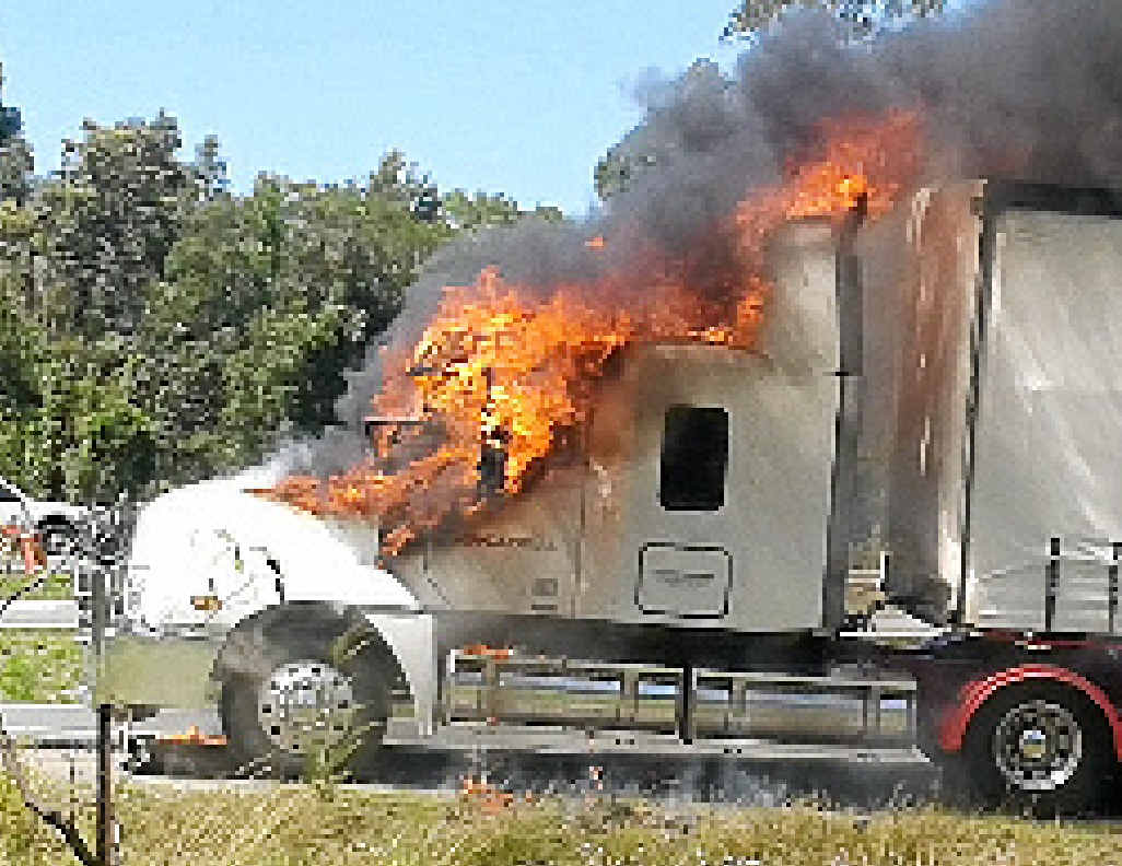 FIRE: Flames begin to erupt in the truck’s cabin. FIRE: Flames begin to erupt in the truck’s cabin.