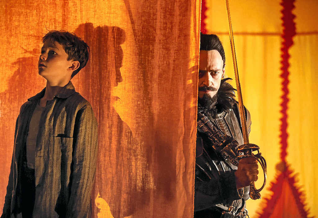 Levi Miller and Hugh Jackman in a scene from the movie Pan. Levi Miller and Hugh Jackman in a scene from the movie Pan.