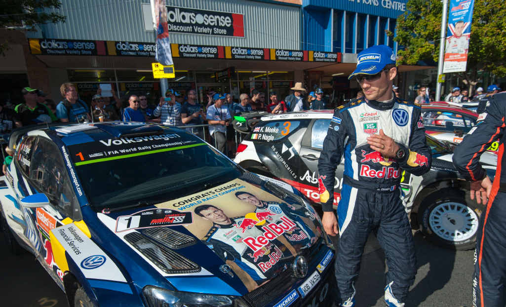 CHAMPION: WRC Rally world champion Sebastien Ogier admires his new-look bonnet last Sunday in the Coffs Harbour after retaining his WRC title. CHAMPION: WRC Rally world champion Sebastien Ogier admires his new-look bonnet last Sunday in the Coffs Harbour after retaining his WRC title.