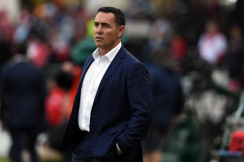 Sharks coach Shane Flanagan watches his team during their warm up before the round X NRL match between the St George Illawarra Dragons and the Cronulla Sutherland Sharks at Jubilee Oval in Sydney on Sunday, May 31, 2015. Sharks coach Shane Flanagan watches his team during their warm up before the round X NRL match between the St George Illawarra Dragons and the Cronulla Sutherland Sharks at Jubilee Oval in Sydney on Sunday, May 31, 2015.