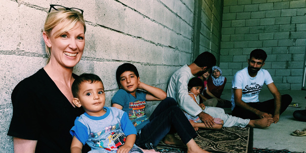 Mohammed was happy with his family in Turkey. Photo / Jo Currie, World Visions Mohammed was happy with his family in Turkey. Photo / Jo Currie, World Visions