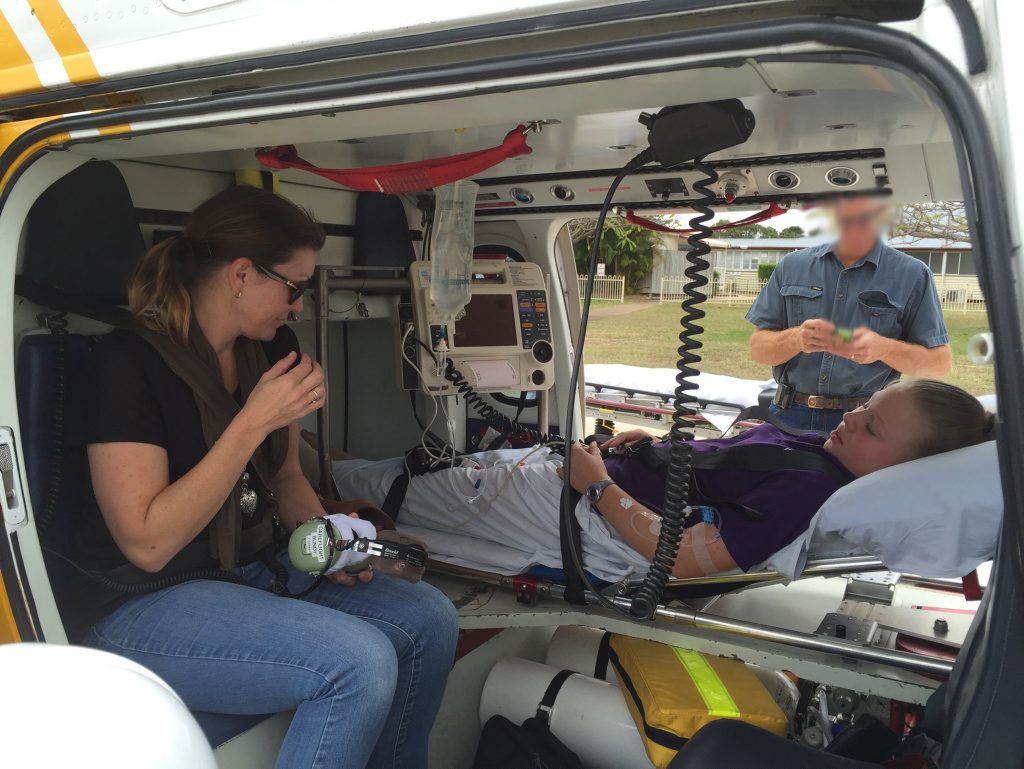 SNAKE BITE: RACQ CareFlight Rescue Aircrewman Brent speaking with patient Brooke prior to take-off Brooke with her mother Photo Contributed SNAKE BITE: RACQ CareFlight Rescue Aircrewman Brent speaking with patient Brooke prior to take-off Brooke with her mother Photo Contributed