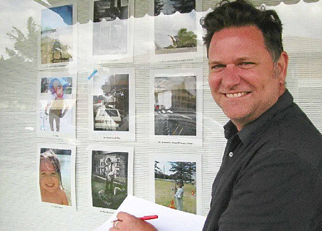HARD CHOICE: Byron Shire mayor Simon Richardson enjoying the Simple Pleasure Photo Competition exhibition in Brunswick Heads. HARD CHOICE: Byron Shire mayor Simon Richardson enjoying the Simple Pleasure Photo Competition exhibition in Brunswick Heads.